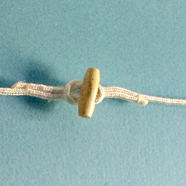 Cordage, loop and toggle button, 15